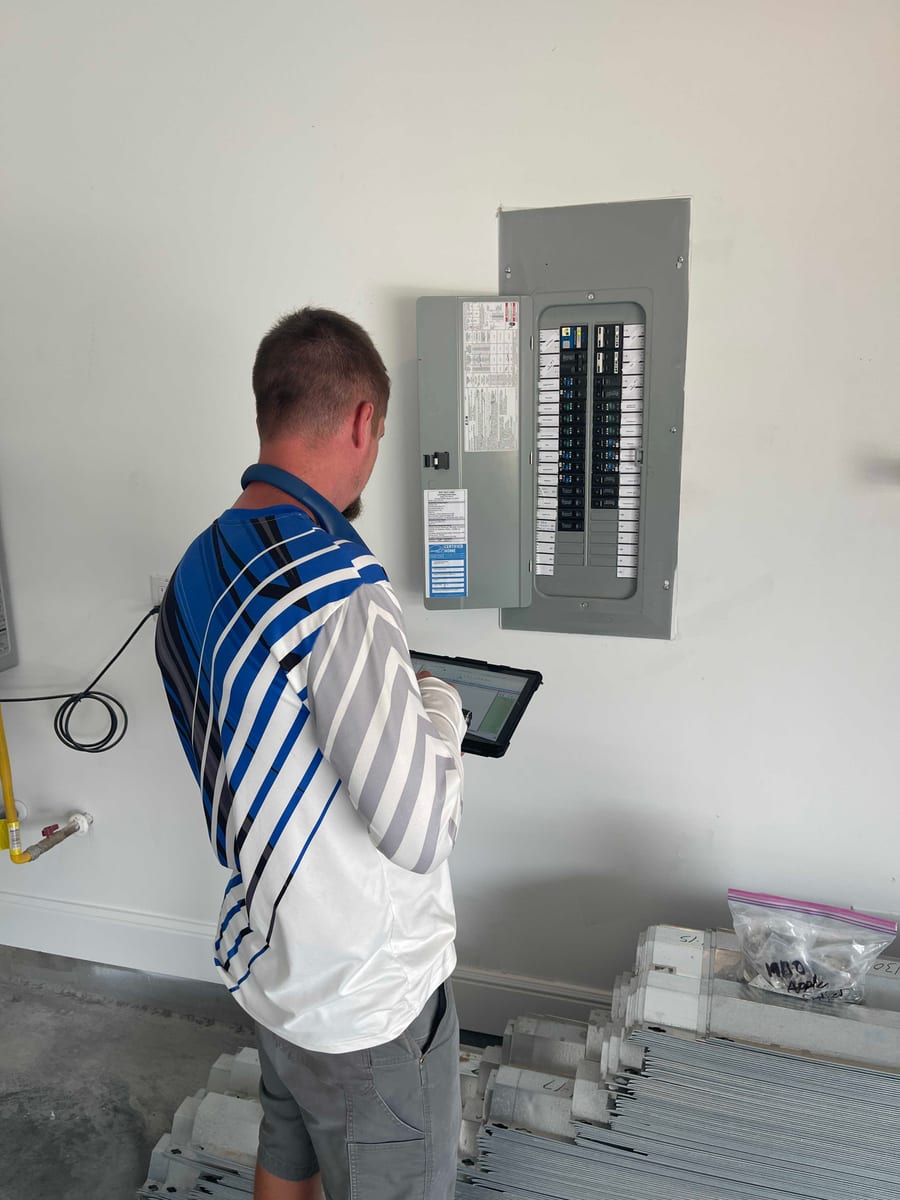 Home inspection of an electrical panel in Pearland TX