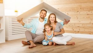 family under cardboard roof | GC Home Inspection | New roofing Pearland
