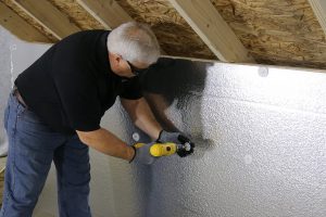  contractor works on the attic | GC Home Inspections | energy bills Pearland