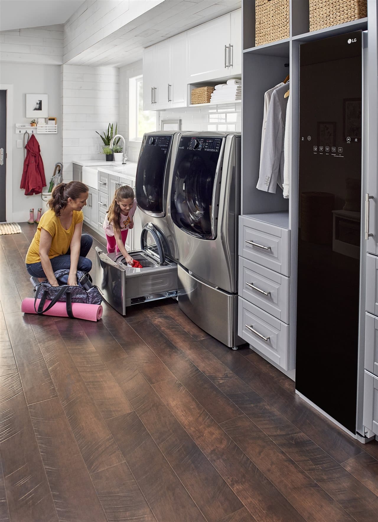 mother and child doing laundry | GC Home Inspection | Household routine Pearland