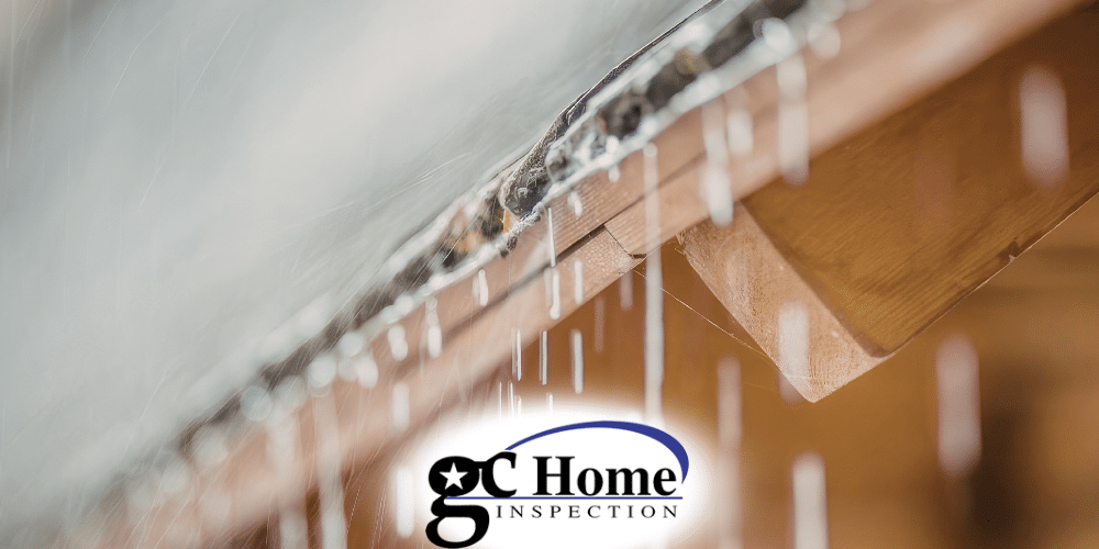 Home inspection Pearland TX showing leaking roof gutter during heavy rain near fascia board