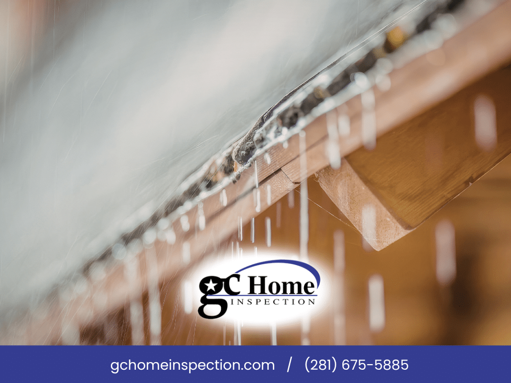 Home inspection Pearland TX showing leaking roof gutter during heavy rain near fascia board
